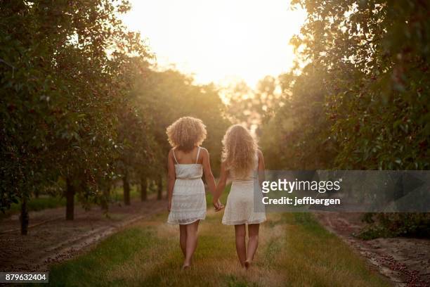 this is what true friendship looks like - barefoot girl stock pictures, royalty-free photos & images