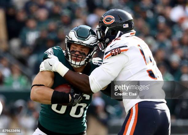 Zach Ertz of the Philadelphia Eagles tries to get around Christian Jones of the Chicago Bears in the first quarter on November 26, 2017 at Lincoln...