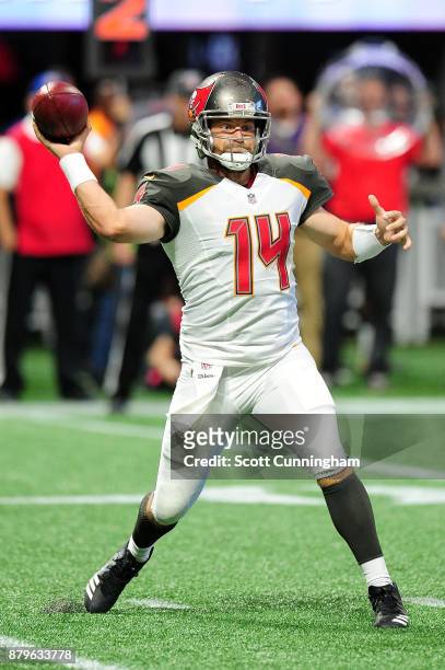 Ryan Fitzpatrick of the Tampa Bay Buccaneers throws a pass during the first half against the Atlanta Falcons at Mercedes-Benz Stadium on November 26,...