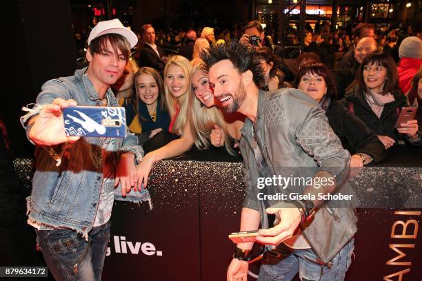 Ehrlich Brothers, Chris Ehrlich and his brother Andreas Ehrlich take a selfie with fans during the Bambi Awards 2017 at Stage Theater on November 16,...