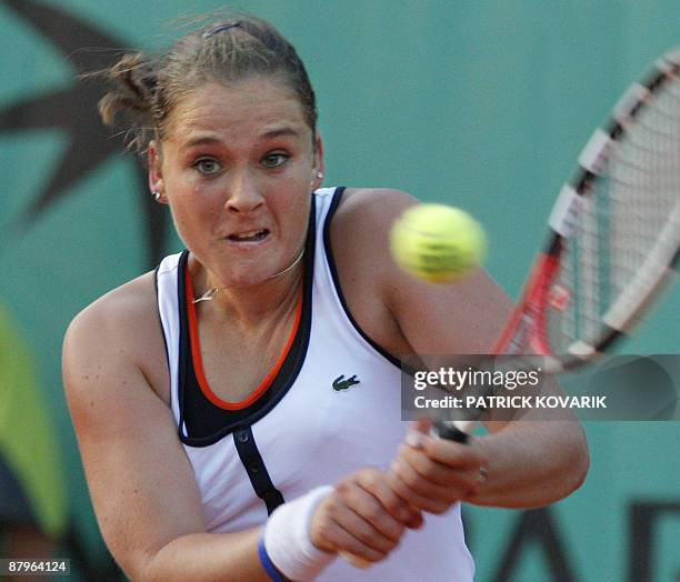 French player Kinnie Laisne hits a return to Australian player Jarmila Groth during their French Open tennis first round match on May 25, 2009 at...