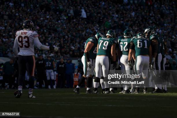 Lane Johnson, Brandon Brooks, Jason Kelce, Stefen Wisniewski, and Halapoulivaati Vaitai of the Philadelphia Eagles huddle in the second quarter...