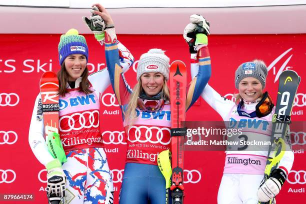 Petra Vlhova of Slovakia, Mikaela Shiffrin of the United States and Bernadette Schild of Austria celebrate on the medals podium after the Slalom...