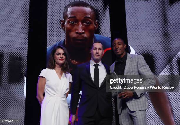 Perry Baker of the United States poses with the World Rugby via Getty Images Men's Sevens Player of the Year Award in association with HSBC during...