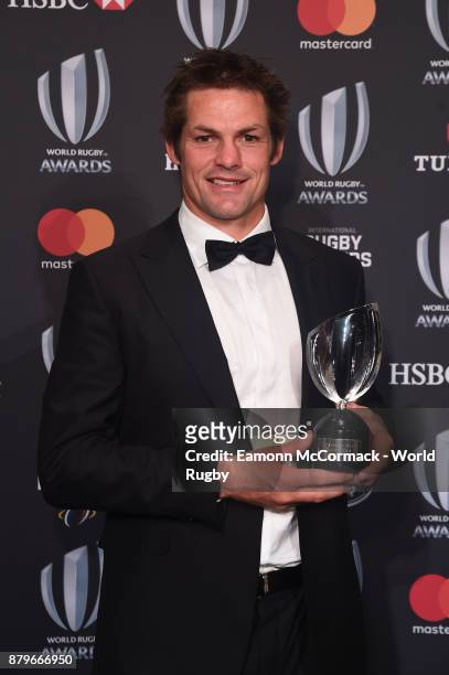 Richie McCaw of New Zealand poses with the IRPA Special Merit Award during the World Rugby via Getty Images Awards 2017 in the Salle des Etoiles at...