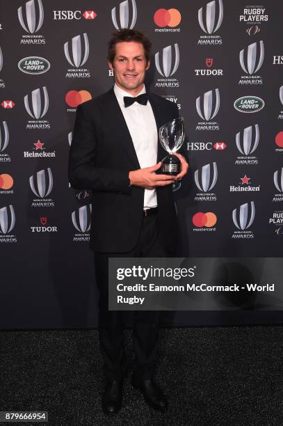 Richie McCaw of New Zealand poses with the IRPA Special Merit Award during the World Rugby via Getty Images Awards 2017 in the Salle des Etoiles at...