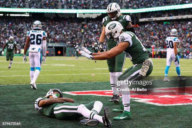 Wide receiver Robby Anderson, wide receiver Jermaine Kearse and tight end Eric Tomlinson of the New York Jets during the third quarter of the game at...