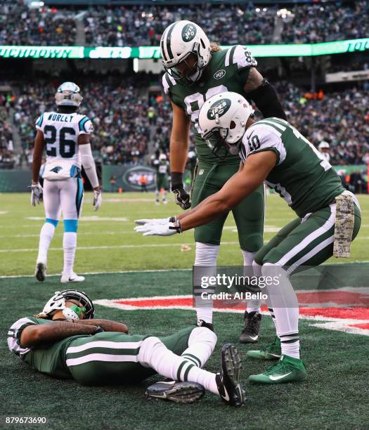 Wide receiver Robby Anderson, wide receiver Jermaine Kearse and tight end Eric Tomlinson of the New York Jets during the third quarter of the game at...