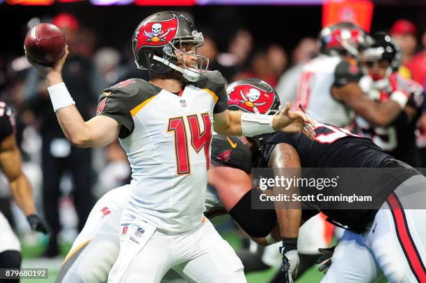 Ryan Fitzpatrick of the Tampa Bay Buccaneers throws a pass during the second half against the Atlanta Falcons at Mercedes-Benz Stadium on November...