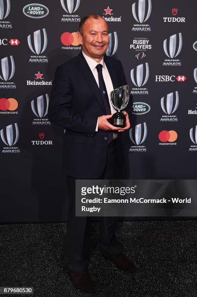 Eddie Jones of England poses with the World Rugby via Getty Images Coach of the Year Award during the World Rugby via Getty Images Awards 2017 in the...