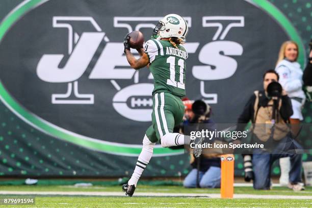 New York Jets wide receiver Robby Anderson makes a catch and run for a touchdown during the National Football League game between the New York Jets...