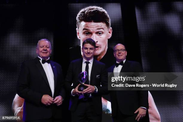 Beauden Barrett of New Zealand receives the World Rugby via Getty Images Men's Player of the Year Award in association with Mastercard from Bill...