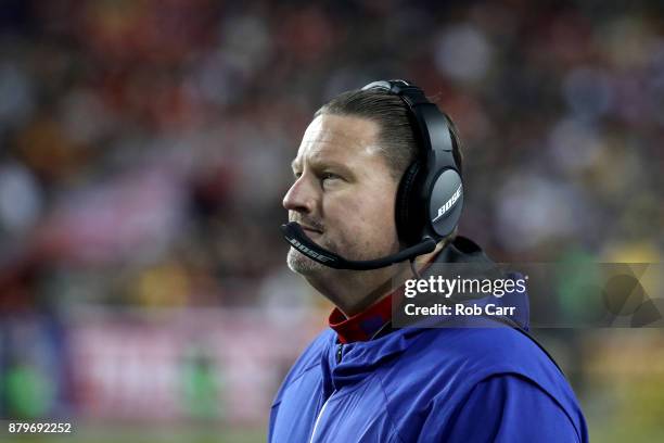 Head coach Ben McAdoo of the New York Giants looks on against the Washington Redskins at FedExField on November 23, 2017 in Landover, Maryland.