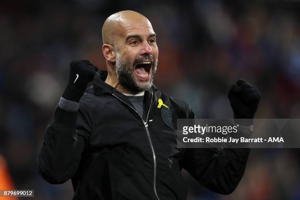 Pep Guardiola the head coach / manager of Manchester City celebrates as Raheem Sterling of Manchester City scores a goal to make it 1-2 during the...