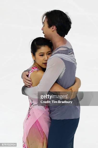 Kana Muramoto and Chris Reed of Japan react after competing in the Ice Dance Free Dance during day three of 2017 Bridgestone Skate America at Herb...