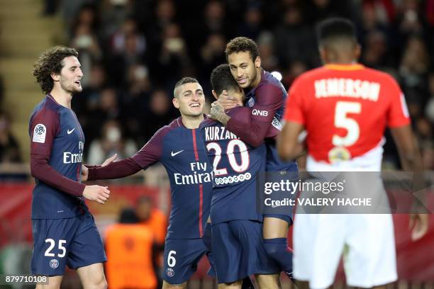 Paris Saint-Germain's Brazilian forward Neymar celebrates with Paris Saint-Germain's French defender Layvin Kurzawa , Paris Saint-Germain's Italian...