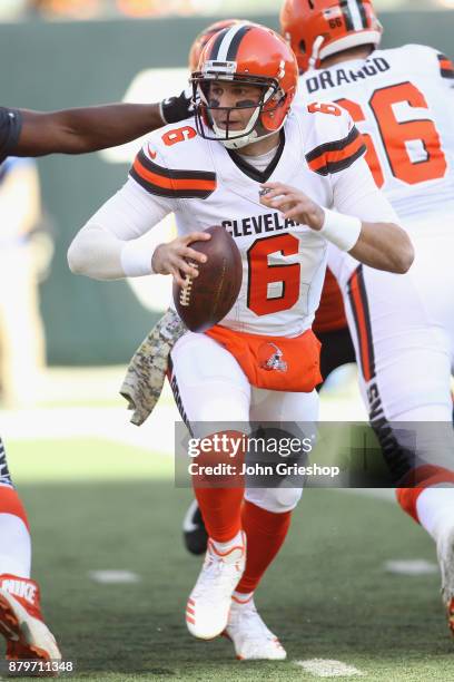 Cody Kessler of the Cleveland Browns rolls out to pass during the game against the Cincinnati Bengals at Paul Brown Stadium on November 26, 2017 in...