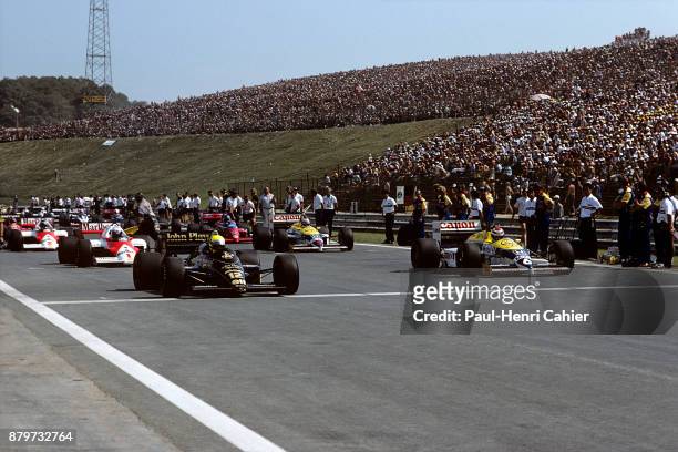 Ayrton Senna, Nelson Piquet, Lotus-Renault 98T, Williams-Honda FW11, Grand Prix of Hungary, Hungaroring, 10 August 1986. Ayrton Senna's Lotus-Renault...