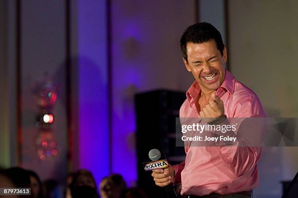Television/Radio Personality Carlos Diaz shows his dance skills to the crowd onstage as he hosted inside the 500 race party at The Conrad Hotel on...