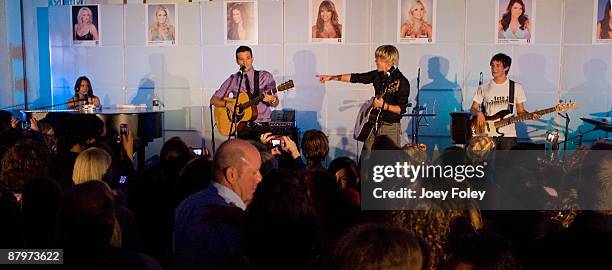 The Ballas-Hough band performs onstage inside the Indy 500 race after party at The Conrad Hotel on May 24, 2009 in Indianapolis, Indiana.