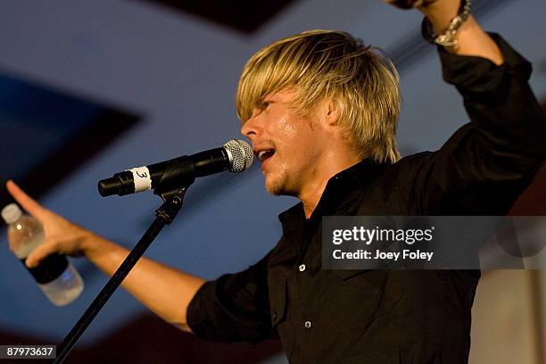 Derek Hough of The Ballas-Hough band performs onstage inside the Indy 500 race after party at The Conrad Hotel on May 24, 2009 in Indianapolis,...