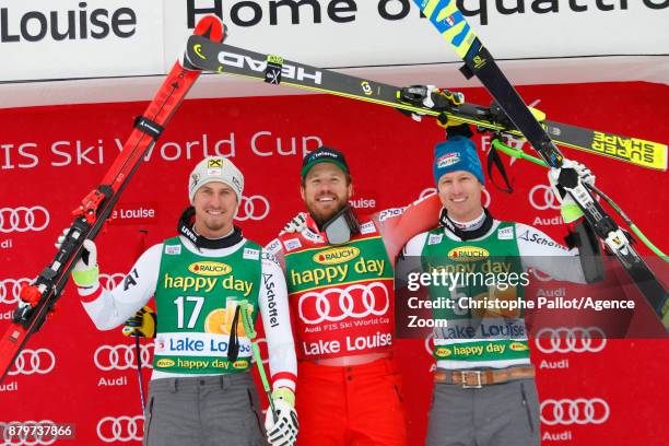 Max Franz of Austria takes 2nd place, Kjetil Jansrud of Norway takes 1st place, Hannes Reichelt of Austria takes 3rd place during the Audi FIS Alpine...