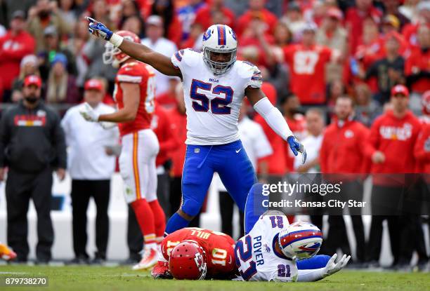 Buffalo Bills middle linebacker Preston Brown points the Bills' way after free safety Jordan Poyer broke up a fourth down pass attempt to Kansas City...