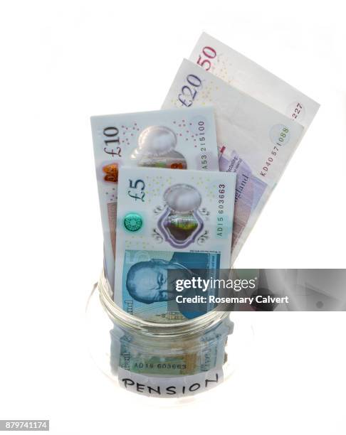 illustrating plenty of investment into pension fund. - british pound note stock pictures, royalty-free photos & images
