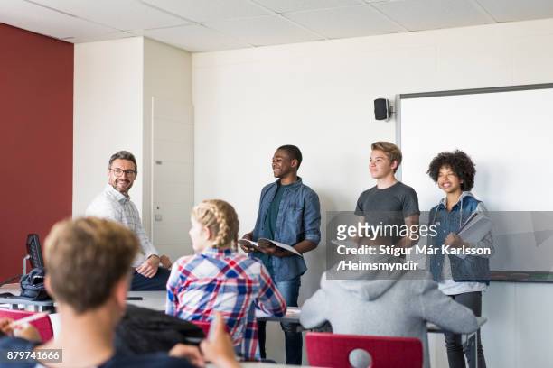 multi-ethnic teenage students giving presentation - boy giving speech stock pictures, royalty-free photos & images
