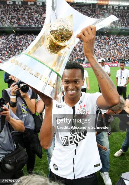 Jo of Corinthians celebrates with the trophy after Corinthians win the Brasileirao 2017 after the match against Atletico MG for the Brasileirao...