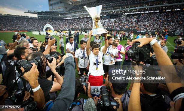 Romero of Corinthians celebrates with the trophy after Corinthians win the Brasileirao 2017 after the match against Atletico MG for the Brasileirao...