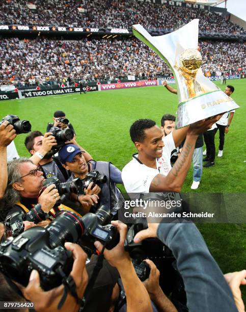 Jo of Corinthians celebrates with the trophy after Corinthians win the Brasileirao 2017 after the match against Atletico MG for the Brasileirao...