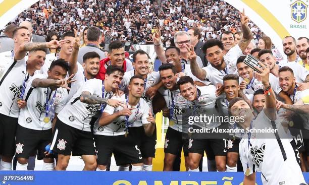 Players of Corinthians celebrate after winning the Brasileirao 2017 during the winning cerimony after the match against Atletico MG for the...