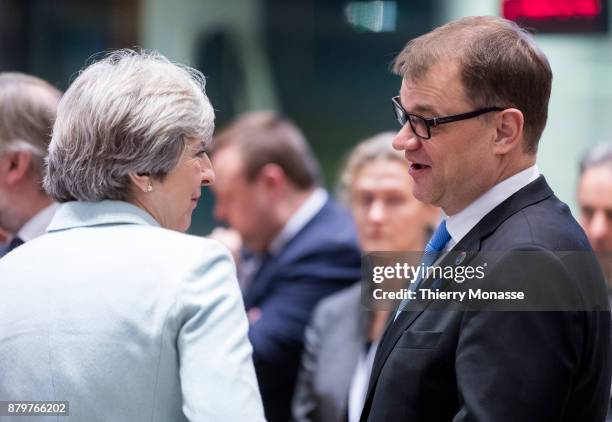 Prime Minister of the United Kingdom Theresa May is talking with the Finish Prime Minister Juha Sipila prior an EU-Eastern partnership summit on...