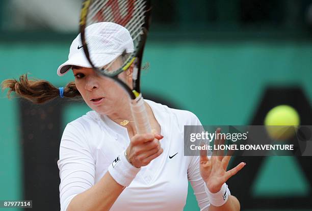 Kazakhstan's Galina Voskoboeva returns a ball to India's Sania Mirza during the French Open tennis first round match on May 26, 2009 at Roland Garros...