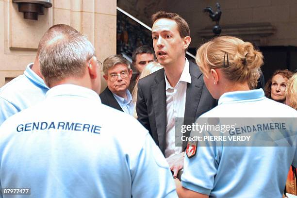 Eric Roux , head of the Paris Celebrity Center of the Scientology Association , arrives at the Paris Court in May 26 for the trial of the Church of...