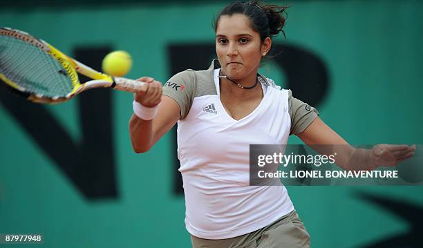 India's Sania Mirza returns a ball to Kazakhstan's Galina Voskoboeva during the French Open tennis second round match on May 26, 2009 at Roland...