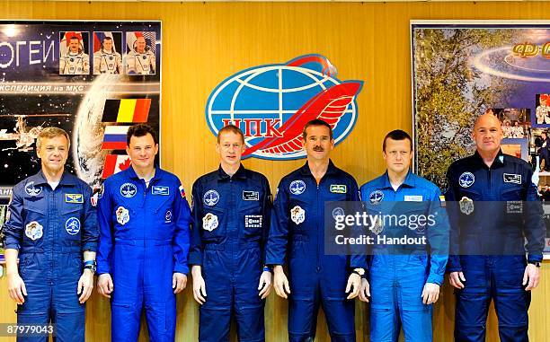 In this handout photo provided by the European Space Agency , The Soyuz TMA-15 crew, Robert Thirsk, Roman Romanenko, Frank De Winne, Chris Hadfield,...