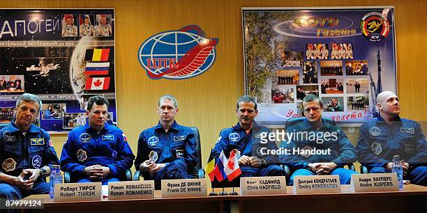 In this handout photo provided by the European Space Agency , The Soyuz TMA-15 crew, Robert Thirsk, Roman Romanenko, Frank De Winne, Chris Hadfield,...