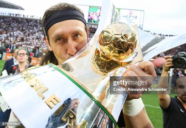 Cassio of Corinthians celebrates with the trophy after Corinthians win the Brasileirao 2017 after the match against Atletico MG for the Brasileirao...