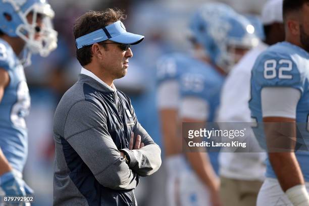 Head coach Larry Fedora of the North Carolina Tar Heels looks on during warm-ups prior to their game against the Western Carolina Catamounts at Kenan...