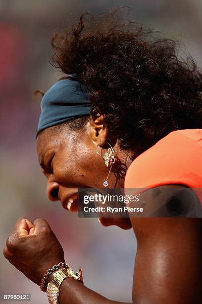 Serena Williams of USA celebrates during the Women's First Round match against Klara Zakopalova of Czech Republic on day three of the French Open at...