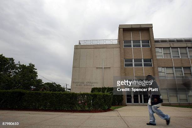 Person walks in front of the Cardinal Spellman High School where President Obama`s pick for the Supreme Court, Judge Sonia Sotomayor, attended school...