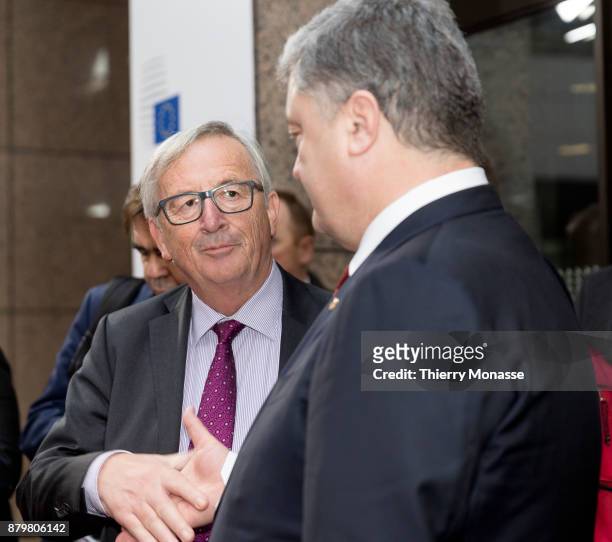 President of the European Union Commission Jean-Claude Juncker is talking with the Ukrainian President Petro Oleksiyovych Poroshenko at the end of an...