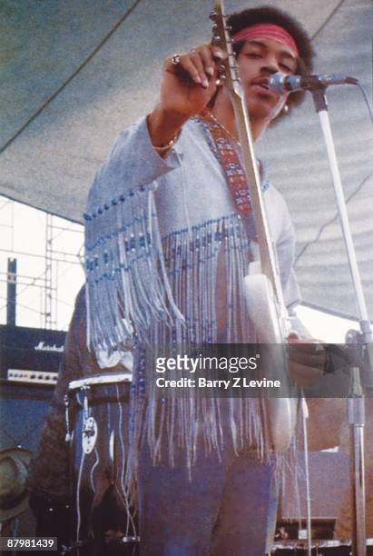 Portrait of legendary guitarist Jimi Hendrix , who with his band the Gypsy Sun And Rainbows, performed the last set onstage at the Woodstock Music...