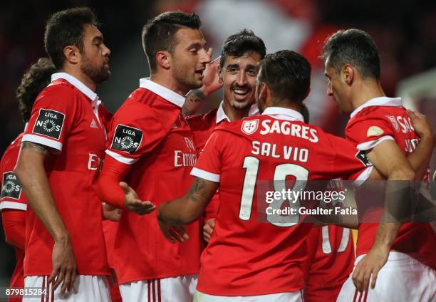 Benfica defender Andre Almeida from Portugal celebrates with teammates after scoring a goal during the Primeira Liga match between SL Benfica and...