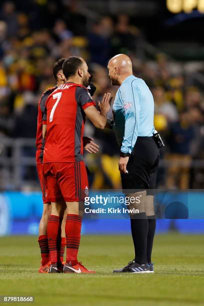 Victor Vazquez of the Toronto FC argues a call with referee Robert Sibiga during the match against the Columbus Crew SC at MAPFRE Stadium on November...