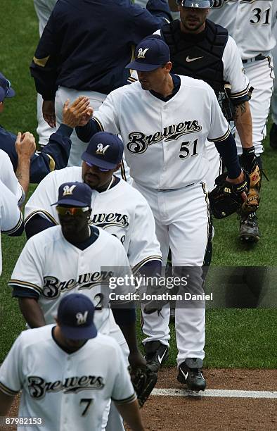 Trevor Hoffman of the Milwaukee Brewers celebrates a win over the Florida Marlins with teammates on May 14, 2009 at Miller Park in Milwaukee,...