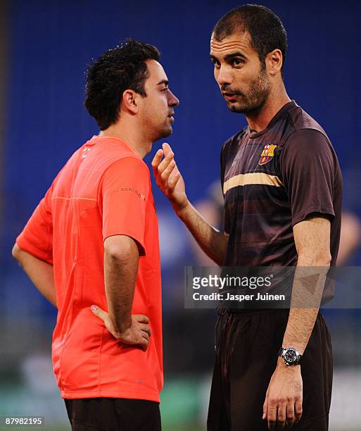 Josep Guardiola coach of Barcelona speaks to Xavi during the Barcelona training session prior to UEFA Champions League Final versus Manchester United...
