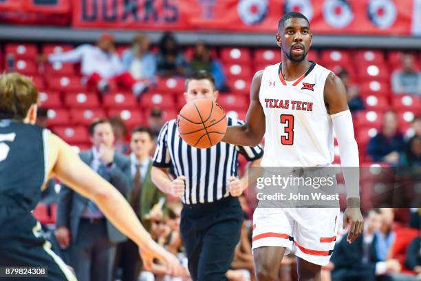 Josh Webster of the Texas Tech Red Raiders brings the ball up court during the game against the Wofford Terriers on November 22, 2017 at United...